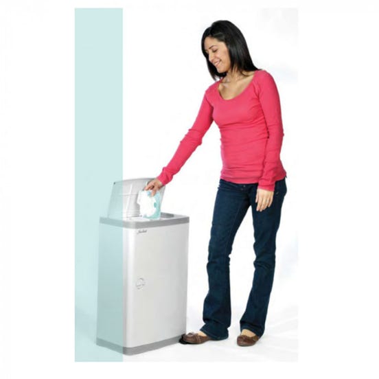 Picture of a woman disposing of an adult diaper in a Janibell diaper disposal pail.